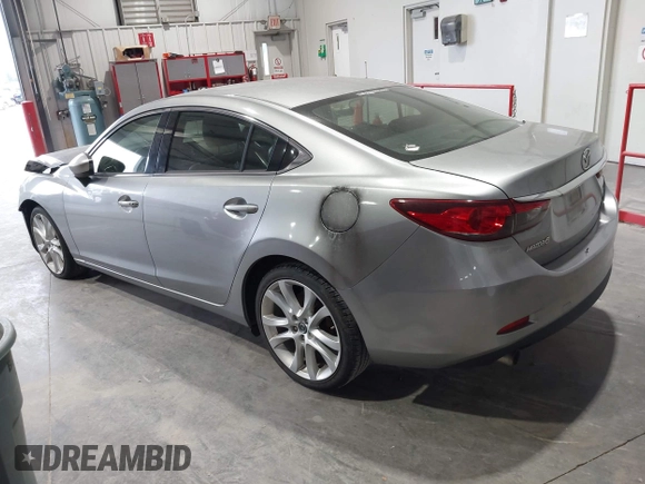 2014 Mazda 6 i Touring with VIN JM1GJ1T51E1106970, listed as a IAAI auction lot 42027350 with 113,756 mi miles and . Bid and sale history available at DreamBid. Image 3.