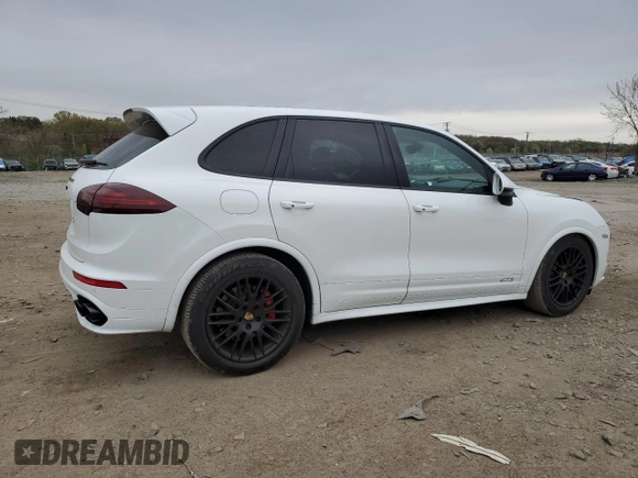 2016 Porsche Cayenne GTS z VIN WP1AD2A27GLA76651, wystawiony jako Copart lot #52693515 z przebiegiem 86 235 mil mil oraz Tytuł czysty. Historia ofert i sprzedaży dostępna na DreamBid. Obrazek 3.