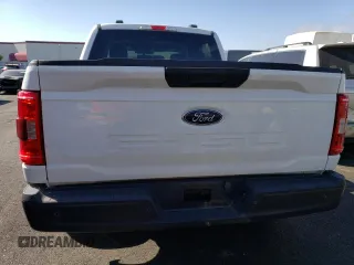 2021 Ford F-150 XL с VIN 1FTFW1CD7MFD11411, выставлен на аукционе Copart как лот 74180004 с пробегом 13 382 миль миль и Списание • Salvage title. История ставок и продаж доступна на DreamBid. Изображение 6.