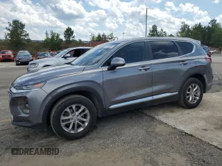 2019 Hyundai Santa Fe SE z VIN 5NMS23AD9KH019915, wystawiony jako Copart lot #57130925 z przebiegiem 124 349 mil mil oraz Czysty tytuł • Clean title. Historia ofert i sprzedaży dostępna na DreamBid. Obrazek 1.