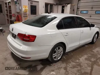 2015 Volkswagen Jetta Sedan 2.0L S with VIN 3VW2K7AJ1FM225534, listed as a IAAI auction lot 41941755 with 123,890 mi miles. Bid and sale history available at carsss.com. Image 4.