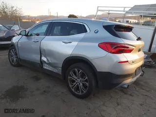 2019 BMW X2 sDrive28i with VIN WBXYJ3C54KEP77217, listed as a IAAI auction lot 41079851 with 100,149 mi miles. Bid and sale history available at carsss.com. Image 3.