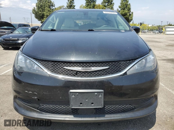 2021 Chrysler Voyager LXi with VIN 2C4RC1DG0MR551892, listed as a Copart auction lot 55516755 with 151,137 mi miles and Clean Title. Bid and sale history available at DreamBid. Image 5.