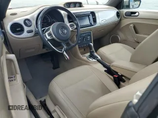 2015 Volkswagen Beetle with VIN 3VW5A7AT9FM815899, listed as a Copart auction lot 63074125 with 77,214 mi miles and Salvage title. Bid and sale history available at DreamBid. Image 8.