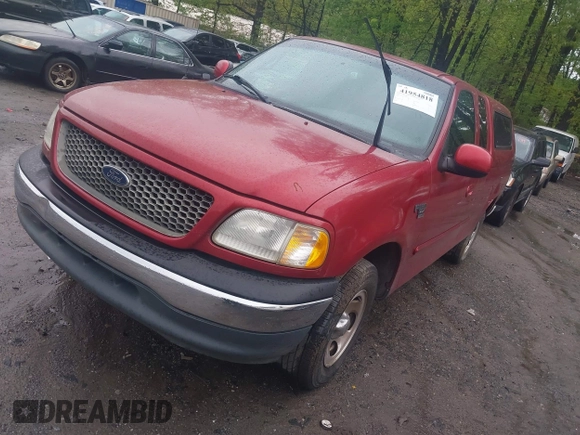 2000 Ford F-150 XL with VIN 1FTRX17W5YNB91724, listed as a IAAI auction lot 41954818 with 156,718 mi miles. Bid and sale history available at carsss.com. Image 2.