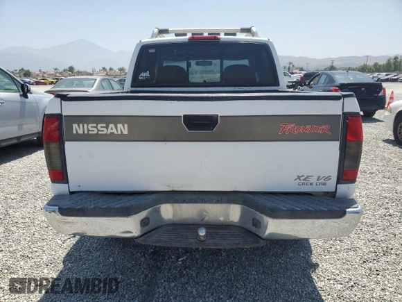 2000 Nissan Frontier XE with VIN 1N6ED27T8YC436513, listed as a Copart auction lot 60338695 with 307,757 mi miles and Clean title. Bid and sale history available at DreamBid. Image 6.