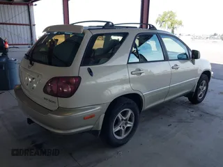 1999 Lexus RX 300 Luxury SUV with VIN JT6HF10UXX0020400, listed as a IAAI auction lot 41866556 with 237,899 mi miles. Bid and sale history available at carsss.com. Image 4.