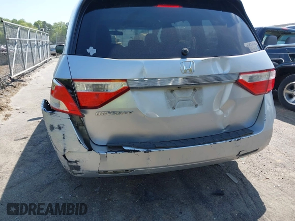 2011 Honda Odyssey EX-L with VIN 5FNRL5H62BB075789, listed as a IAAI auction lot 42035746 with 238,616 mi miles and . Bid and sale history available at carsss.com. Image 6.