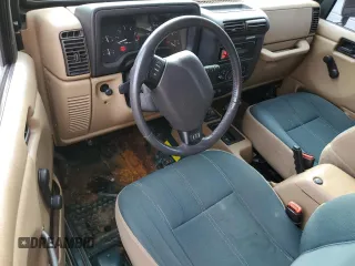 2000 Jeep Wrangler Sahara with VIN 1J4FA59S1YP747919, listed as a Copart auction lot 72278044 with 157,360 mi miles and Salvage Title. Bid and sale history available at carsss.com. Image 8.