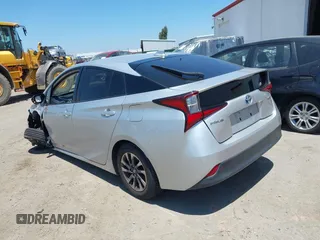 2022 Toyota Prius L Eco with VIN JTDKAMFU5N3188107, listed as a IAAI auction lot 42223649 with 180,894 mi miles and . Bid and sale history available at DreamBid. Image 3.