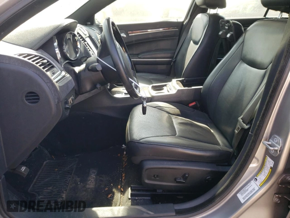 2014 Chrysler 300 C with VIN 2C3CCAKG3EH157999, listed as a Copart auction lot 74798564 with 136,277 mi miles and Salvage Title. Bid and sale history available at carsss.com. Image 7.