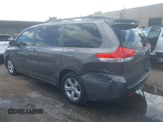 2011 Toyota Sienna LE AAS with VIN 5TDKK3DC4BS044382, listed as a IAAI auction lot 39280364 with 104,262 mi miles. Bid and sale history available at carsss.com. Image 3.