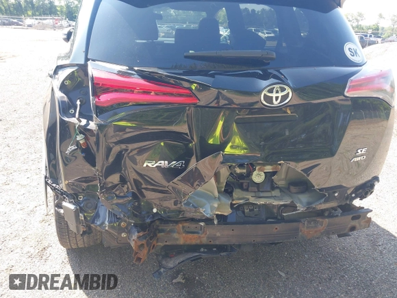 2016 Toyota RAV4 SE with VIN JTMJFREV2GJ089599, listed as a IAAI auction lot 42551300 with 90,352 mi miles and . Bid and sale history available at DreamBid. Image 6.
