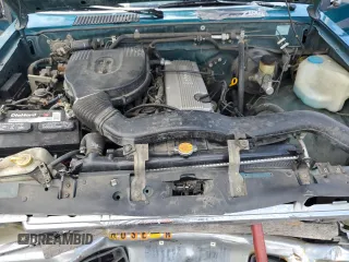 1997 Nissan Frontier XE with VIN 1N6SD11SXVC332100, listed as a Copart auction lot 54330245 with 203,959 mi miles and Salvage title. Bid and sale history available at DreamBid. Image 11.