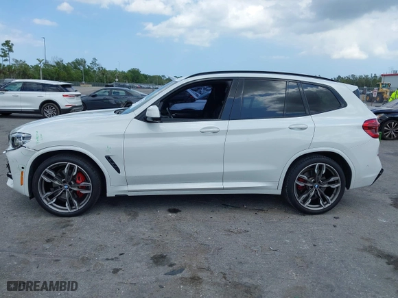 2021 BMW X3 M40i with VIN 5UXTY9C04M9G46876, listed as a IAAI auction lot 41965573 with 112,893 mi miles. Bid and sale history available at carsss.com. Image 14.