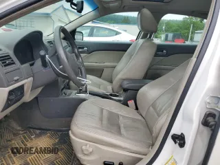2010 Ford Fusion Hybrid with VIN 3FADP0L36AR203663, listed as a Copart auction lot 60310095 with 211,922 mi miles and Salvage title. Bid and sale history available at DreamBid. Image 7.