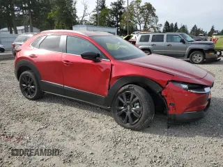 2024 Mazda CX-30 S Select Sport z VIN 3MVDMBBM9RM672178, wystawiony jako Copart lot #55751065 z przebiegiem 6 121 mil mil oraz Szkoda całkowita • Salvage title. Historia ofert i sprzedaży dostępna na DreamBid. Obrazek 4.