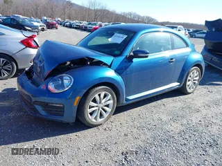 2017 Volkswagen Beetle 1.8T Fleet with VIN 3VWF17ATXHM630753, listed as a IAAI auction lot 41516106 with 62,841 mi miles. Bid and sale history available at carsss.com. Image 2.