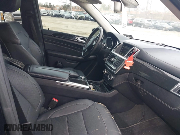 2015 Mercedes-Benz M 400 with VIN 4JGDA5GB3FA565277, listed as a IAAI auction lot 41590051 with 75,980 mi miles and . Bid and sale history available at DreamBid. Image 5.