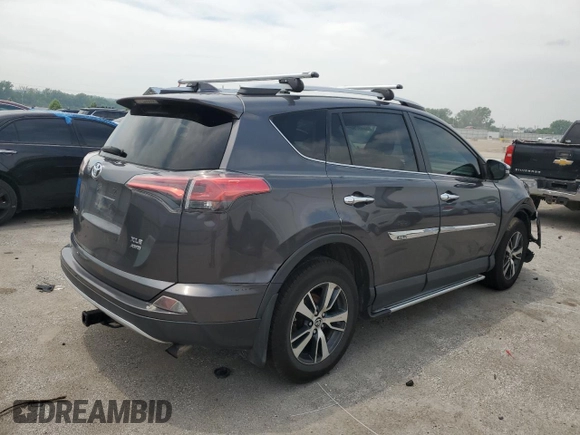 2016 Toyota RAV4 XLE with VIN 2T3RFREV0GW412875, listed as a Copart auction lot 59497545 with 226,604 mi miles and Salvage title. Bid and sale history available at DreamBid. Image 3.