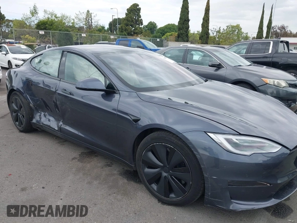 2021 Tesla Model S Long Range с VIN 5YJSA1E57MF441387, выставлен на аукционе IAAI как лот 42034307 с пробегом Не указан миль и . История ставок и продаж доступна на DreamBid. Изображение 13.