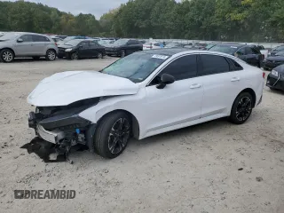 2022 Kia K5 GT-Line z VIN 5XXG64J24NG121396, wystawiony jako Copart lot #73097674 z przebiegiem 77 813 mil mil oraz Szkody całkowita. Historia ofert i sprzedaży dostępna na DreamBid. Obrazek 1.