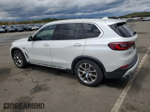 2022 BMW X5 xDrive45e with VIN 5UXTA6C03N9L84706, listed as a Copart auction lot 50725583 with 25,616 mi miles and . Bid and sale history available at DreamBid. Image 2.