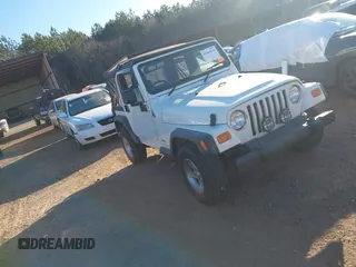 2004 Jeep Wrangler Sport Right Hand Drive with VIN 1J4F449S74P732854, listed as a IAAI auction lot 41408316 with 112,064 mi miles. Bid and sale history available at carsss.com. Image 1.