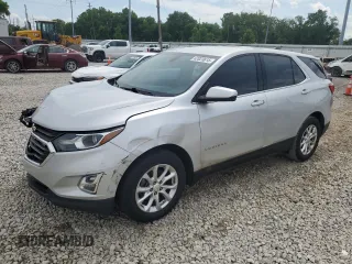 2018 Chevrolet Equinox LT with VIN 2GNAXJEV0J6303631, listed as a Copart auction lot 62023615 with 242,600 mi miles and Clean title. Bid and sale history available at DreamBid. Image 1.