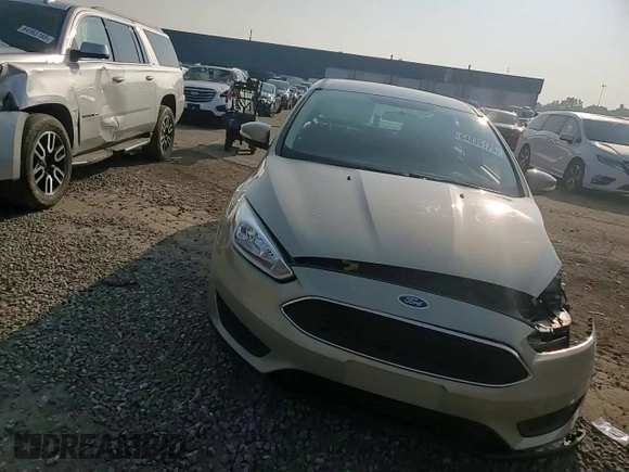 2015 Ford Focus SE with VIN 1FADP3F22FL383928, listed as a Copart auction lot 64835175 with 77,594 mi miles and Clean title. Bid and sale history available at DreamBid. Image 14.