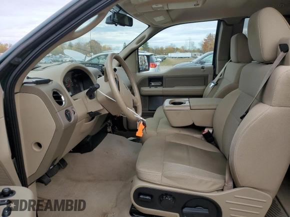 2007 Ford F-150 XLT with VIN 1FTVX14507NA54957, listed as a Copart auction lot 77713124 with 138,681 mi miles and Salvage Title. Bid and sale history available at carsss.com. Image 7.