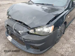2011 Mitsubishi Lancer ES z VIN JA32U2FU0BU043024, wystawiony jako IAAI lot #42367152 z przebiegiem 167 655 mil mil oraz . Historia ofert i sprzedaży dostępna na DreamBid. Obrazek 6.