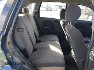 2003 Chrysler PT Cruiser with VIN 3C4FY48B13T570032, listed as a IAAI auction lot 41603951 with 97,590 mi miles. Bid and sale history available at carsss.com. Image 8.