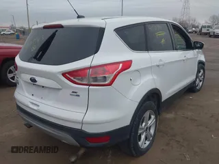 2014 Ford Escape SE with VIN 1FMCU9G93EUD37963, listed as a IAAI auction lot 41178797 with 171,149 mi miles and . Bid and sale history available at DreamBid. Image 4.