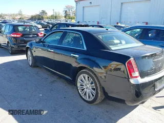 2012 Chrysler 300 C Luxury Series with VIN 2C3CCAPT4CH289639, listed as a IAAI auction lot 40634352 with 118,958 mi miles and . Bid and sale history available at carsss.com. Image 3.