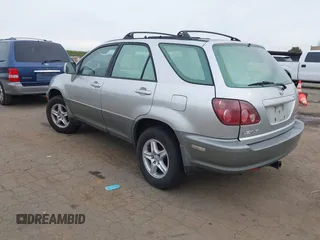 1999 Lexus RX 300 Luxury SUV with VIN JT6HF10U5X0017629, listed as a IAAI auction lot 41569806 with 174,068 mi miles. Bid and sale history available at carsss.com. Image 3.