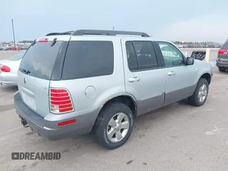 2005 Mercury Mountaineer Convenience z VIN 4M2ZU86K65UJ10015, wystawiony jako IAAI lot #42063970 z przebiegiem 153 542 mil mil oraz . Historia ofert i sprzedaży dostępna na DreamBid. Obrazek 4.