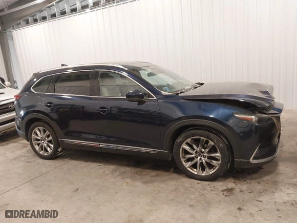 2016 Mazda CX-9 Grand Touring with VIN JM3TCBDY9G0109770, listed as a IAAI auction lot 41551085 with 131,812 mi miles. Bid and sale history available at carsss.com. Image 14.