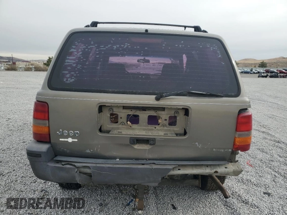1995 Jeep Grand Cherokee Laredo with VIN 1J4GZ58S7SC743239, listed as a Copart auction lot 81717114 with 254,061 mi miles and Salvage Title. Bid and sale history available at carsss.com. Image 6.