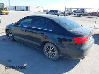 2012 Volkswagen Jetta Sedan SEL w/Sunroof with VIN 3VWLX7AJ2CM388825, listed as a IAAI auction lot 40490216 with 144,694 mi miles. Bid and sale history available at carsss.com. Image 3.