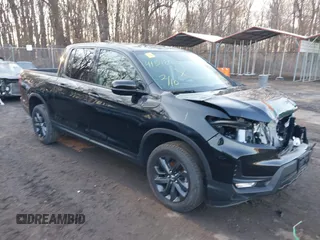 2024 Honda Ridgeline Sport with VIN 5FPYK3F14RB012334, listed as a IAAI auction lot 41542412 with 1,817 mi miles and . Bid and sale history available at DreamBid. Image 1.
