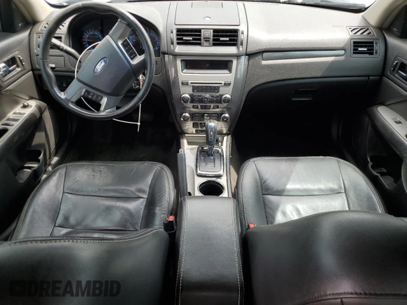 2012 Ford Fusion SEL with VIN 3FAHP0JA0CR386841, listed as a Copart auction lot 61587325 with 129,572 mi miles and Salvage title. Bid and sale history available at DreamBid. Image 8.