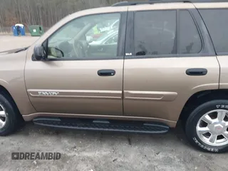 2003 GMC Envoy SLE with VIN 1GKDT13S332264984, listed as a IAAI auction lot 41523191 with 227,004 mi miles. Bid and sale history available at carsss.com. Image 14.