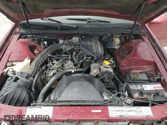 1993 Ford Thunderbird z VIN 1FAPP624XPH165181, wystawiony jako Copart lot #56587485 z przebiegiem 78 273 mil mil oraz Szkoda całkowita • Salvage title. Historia ofert i sprzedaży dostępna na DreamBid. Obrazek 11.