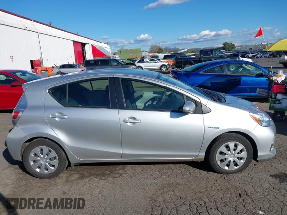 2014 Toyota Prius One z VIN JTDKDTB32E1574607, wystawiony jako IAAI lot #41724312 z przebiegiem 102 612 mil mil oraz . Historia ofert i sprzedaży dostępna na DreamBid. Obrazek 13.