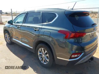 2019 Hyundai Santa Fe SE with VIN 5NMS23AD2KH134016, listed as a IAAI auction lot 41977240 with 61,448 mi miles and . Bid and sale history available at DreamBid. Image 3.