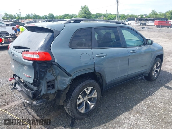 2014 Jeep Cherokee Trailhawk z VIN 1C4PJMBS4EW236950, wystawiony jako IAAI lot #42636128 z przebiegiem 170 491 mil mil oraz . Historia ofert i sprzedaży dostępna na DreamBid. Obrazek 4.
