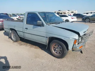 1990 Nissan Trucks 2WD XE with VIN 1N6SD11S4LC400985, listed as a IAAI auction lot 41986390 with 189,924 mi miles. Bid and sale history available at carsss.com. Image 1.
