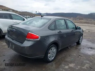 2009 Ford Focus S with VIN 1FAHP34N89W211162, listed as a IAAI auction lot 41677415 with 94,597 mi miles. Bid and sale history available at carsss.com. Image 4.