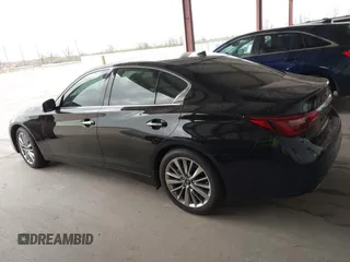 2023 Infiniti Q50 Luxe with VIN JN1EV7BPXPM512588, listed as a IAAI auction lot 41819661 with 30,817 mi miles and . Bid and sale history available at DreamBid. Image 14.